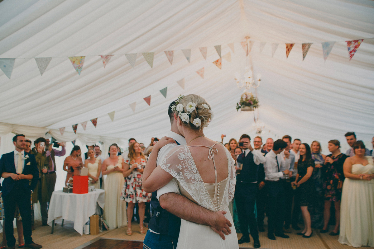 Katie wore a Catherne Deane gown from Leonie Claire bridal boutique in Hove, for her lovely summer garden wedding. Photography by Manon Pauffin.