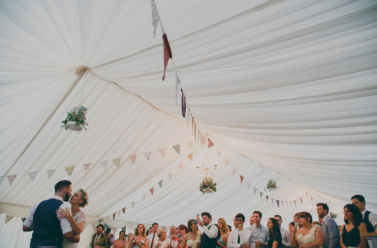 Katie wore a Catherne Deane gown from Leonie Claire bridal boutique in Hove, for her lovely summer garden wedding. Photography by Manon Pauffin.