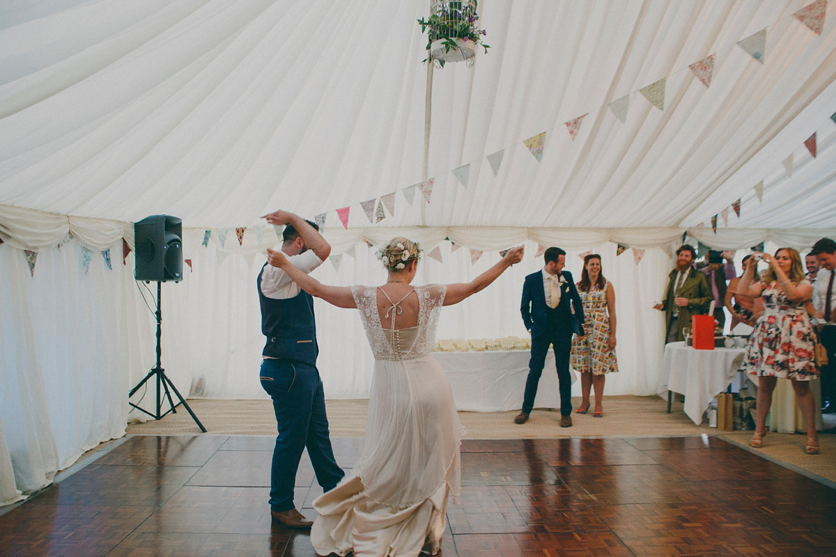 Katie wore a Catherne Deane gown from Leonie Claire bridal boutique in Hove, for her lovely summer garden wedding. Photography by Manon Pauffin.