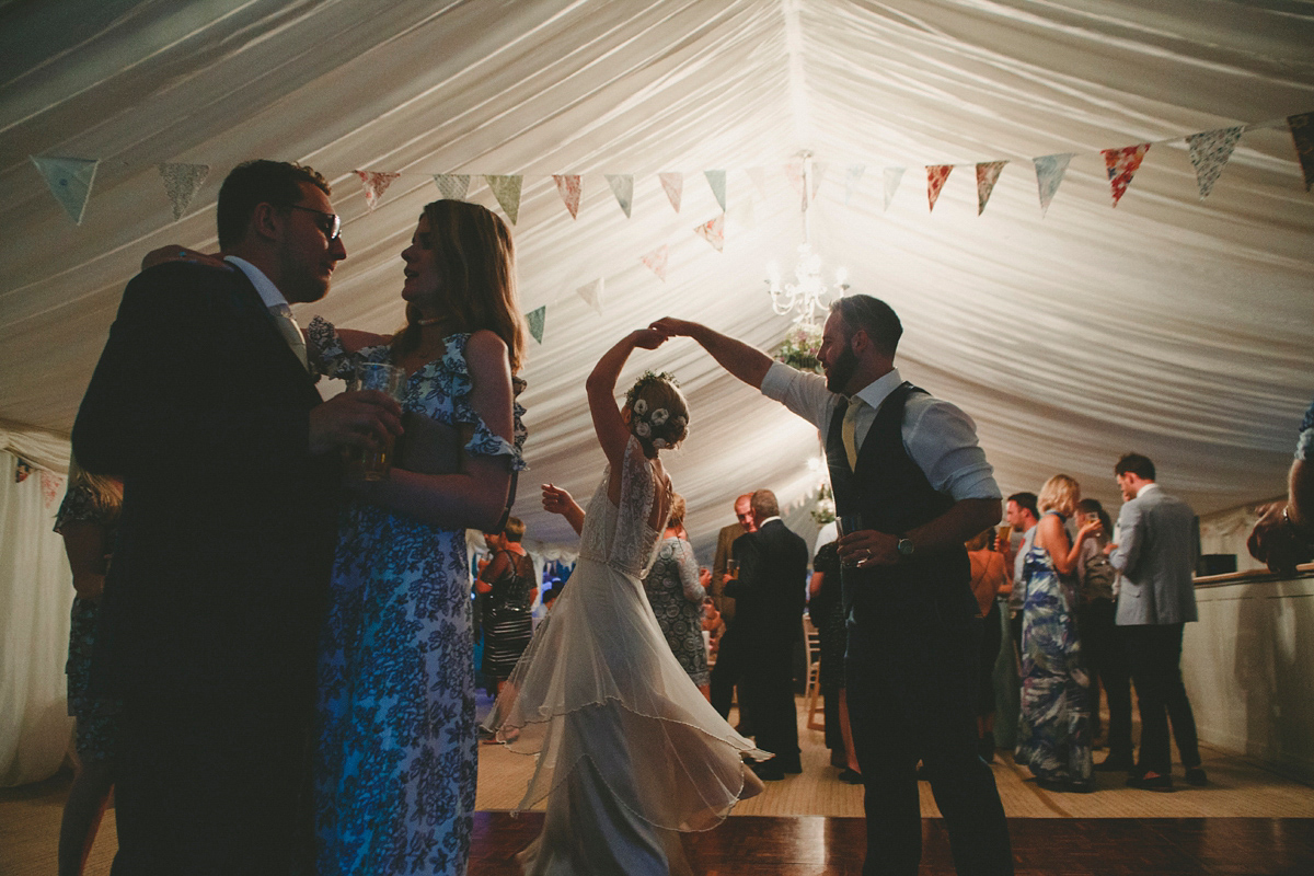 Katie wore a Catherne Deane gown from Leonie Claire bridal boutique in Hove, for her lovely summer garden wedding. Photography by Manon Pauffin.