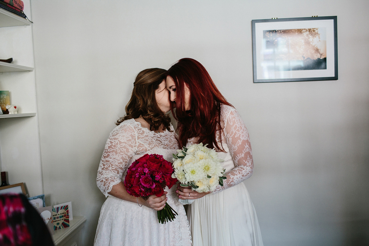 Kate and Lauren married in Catherine Deane and Candy Anthony gowns at Chelsea Town Hall in the Autumn. Photography by Cluadia Rose Carter.