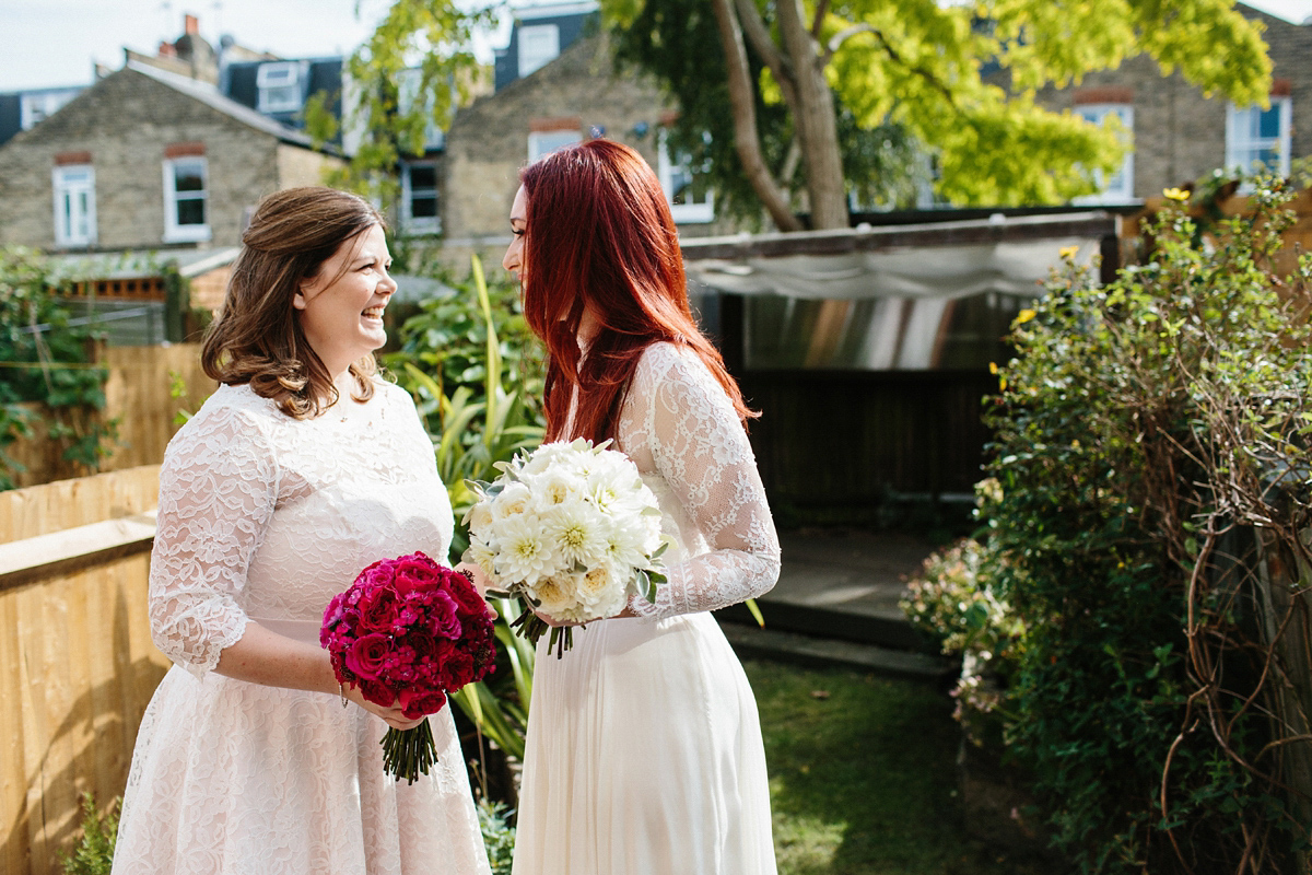 Kate and Lauren married in Catherine Deane and Candy Anthony gowns at Chelsea Town Hall in the Autumn. Photography by Cluadia Rose Carter.