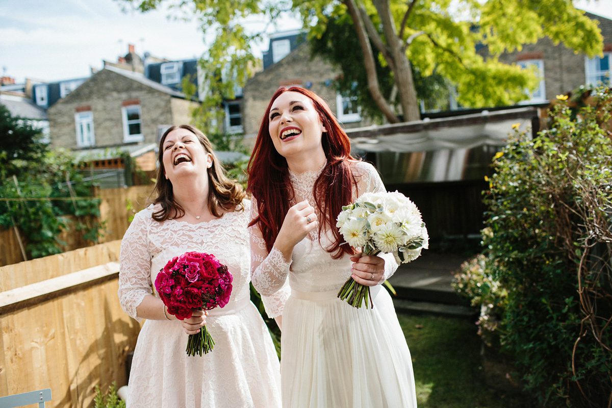 Kate and Lauren married in Catherine Deane and Candy Anthony gowns at Chelsea Town Hall in the Autumn. Photography by Cluadia Rose Carter.