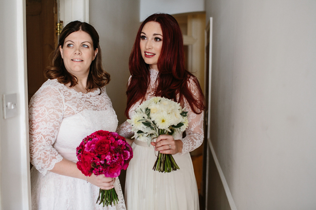 Kate and Lauren married in Catherine Deane and Candy Anthony gowns at Chelsea Town Hall in the Autumn. Photography by Cluadia Rose Carter.