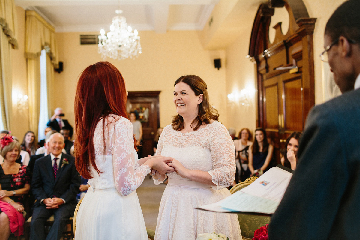 Kate and Lauren married in Catherine Deane and Candy Anthony gowns at Chelsea Town Hall in the Autumn. Photography by Cluadia Rose Carter.