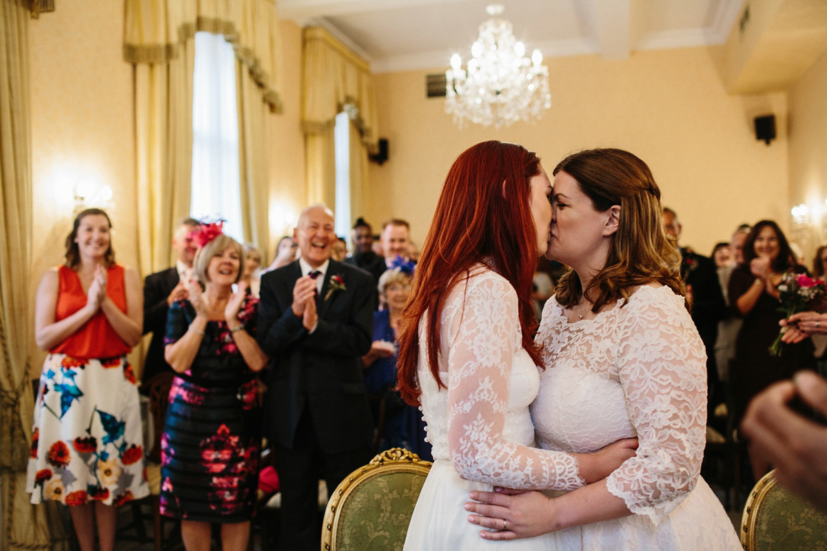 Kate and Lauren married in Catherine Deane and Candy Anthony gowns at Chelsea Town Hall in the Autumn. Photography by Cluadia Rose Carter.
