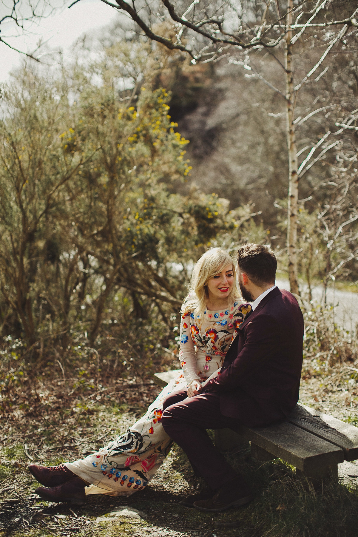 Gillian wore a colourful embroidered long sleeved gown by Temperley for her modern and alternative Woodside Warehouse wedding in Glasgow. Photography by Dan O'Day.