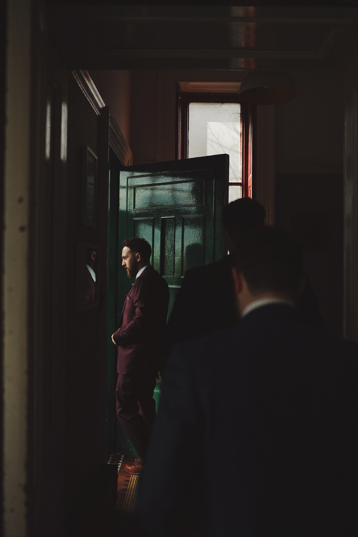 Gillian wore a colourful embroidered long sleeved gown by Temperley for her modern and alternative Woodside Warehouse wedding in Glasgow. Photography by Dan O'Day.