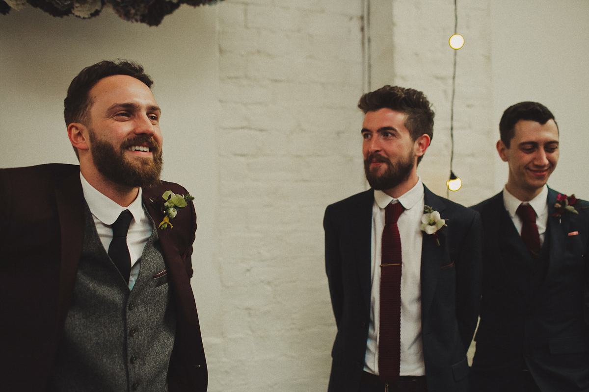 Gillian wore a colourful embroidered long sleeved gown by Temperley for her modern and alternative Woodside Warehouse wedding in Glasgow. Photography by Dan O'Day.