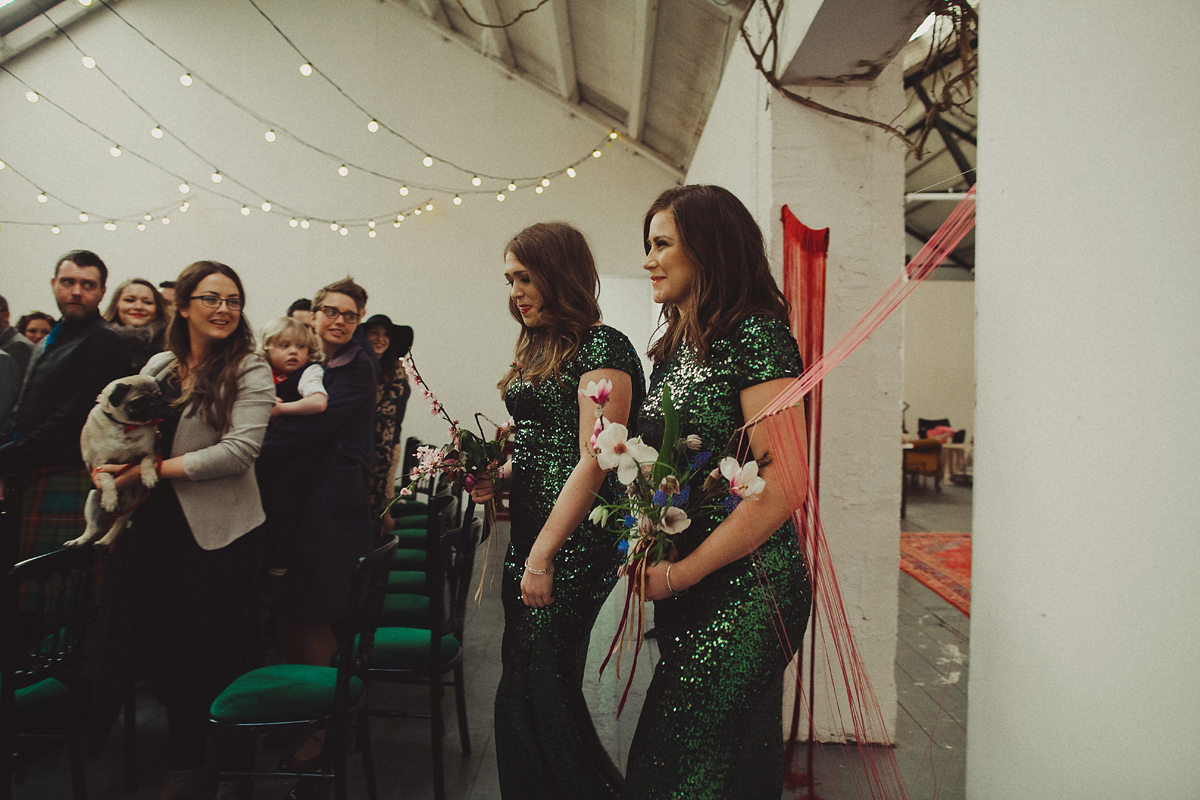 Gillian wore a colourful embroidered long sleeved gown by Temperley for her modern and alternative Woodside Warehouse wedding in Glasgow. Photography by Dan O'Day.