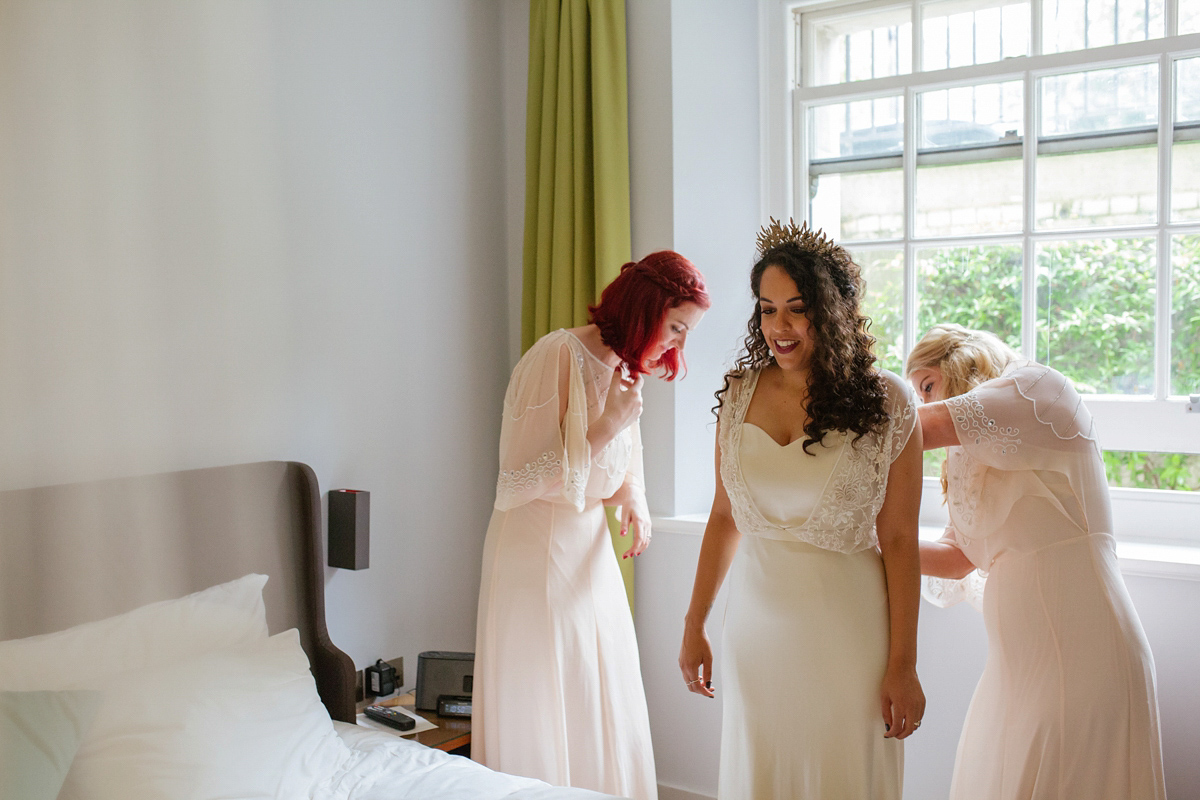 Bianca wore a Catherine Deane gown for her kitsch, cool and disco inspired London wedding. Photography by Emma Case.