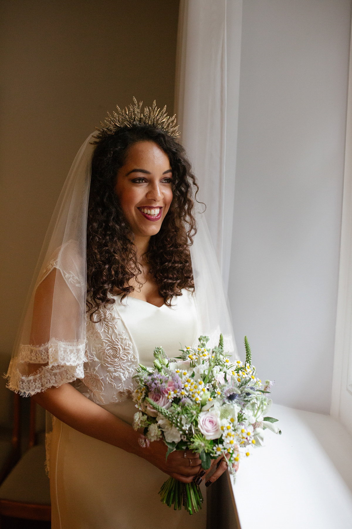 Bianca wore a Catherine Deane gown for her kitsch, cool and disco inspired London wedding. Photography by Emma Case.