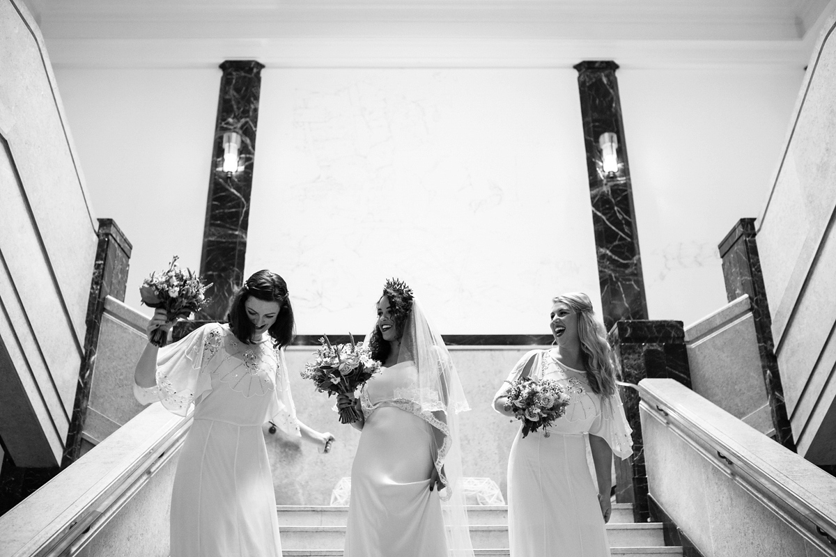 Bianca wore a Catherine Deane gown for her kitsch, cool and disco inspired London wedding. Photography by Emma Case.