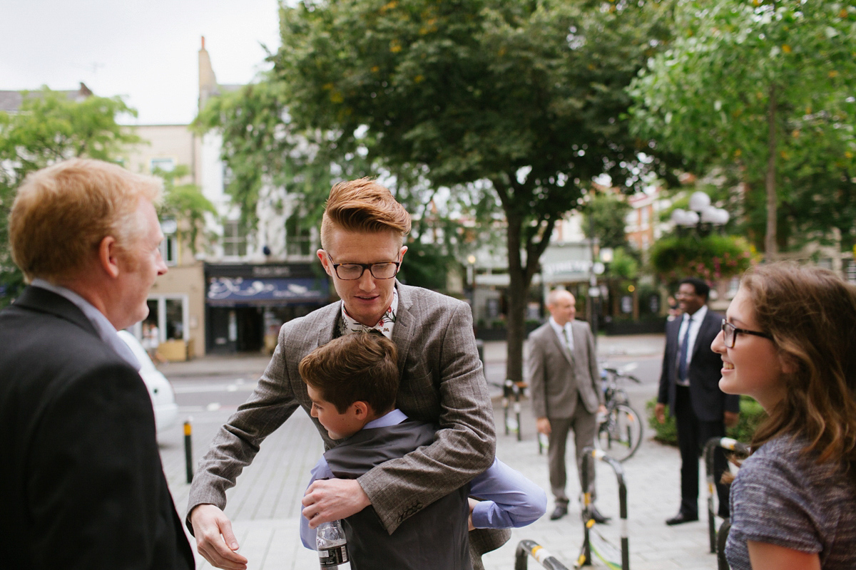 Bianca wore a Catherine Deane gown for her kitsch, cool and disco inspired London wedding. Photography by Emma Case.