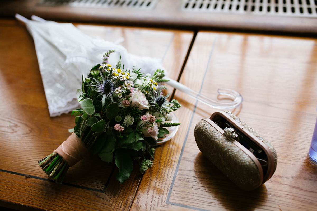 Bianca wore a Catherine Deane gown for her kitsch, cool and disco inspired London wedding. Photography by Emma Case.