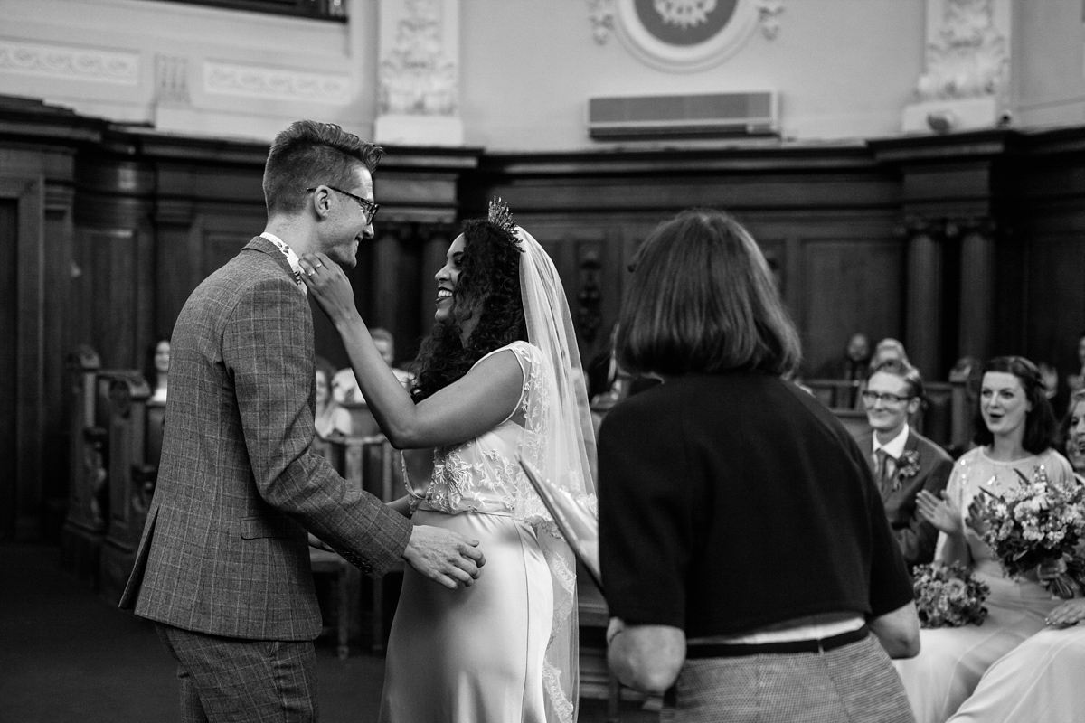 Bianca wore a Catherine Deane gown for her kitsch, cool and disco inspired London wedding. Photography by Emma Case.