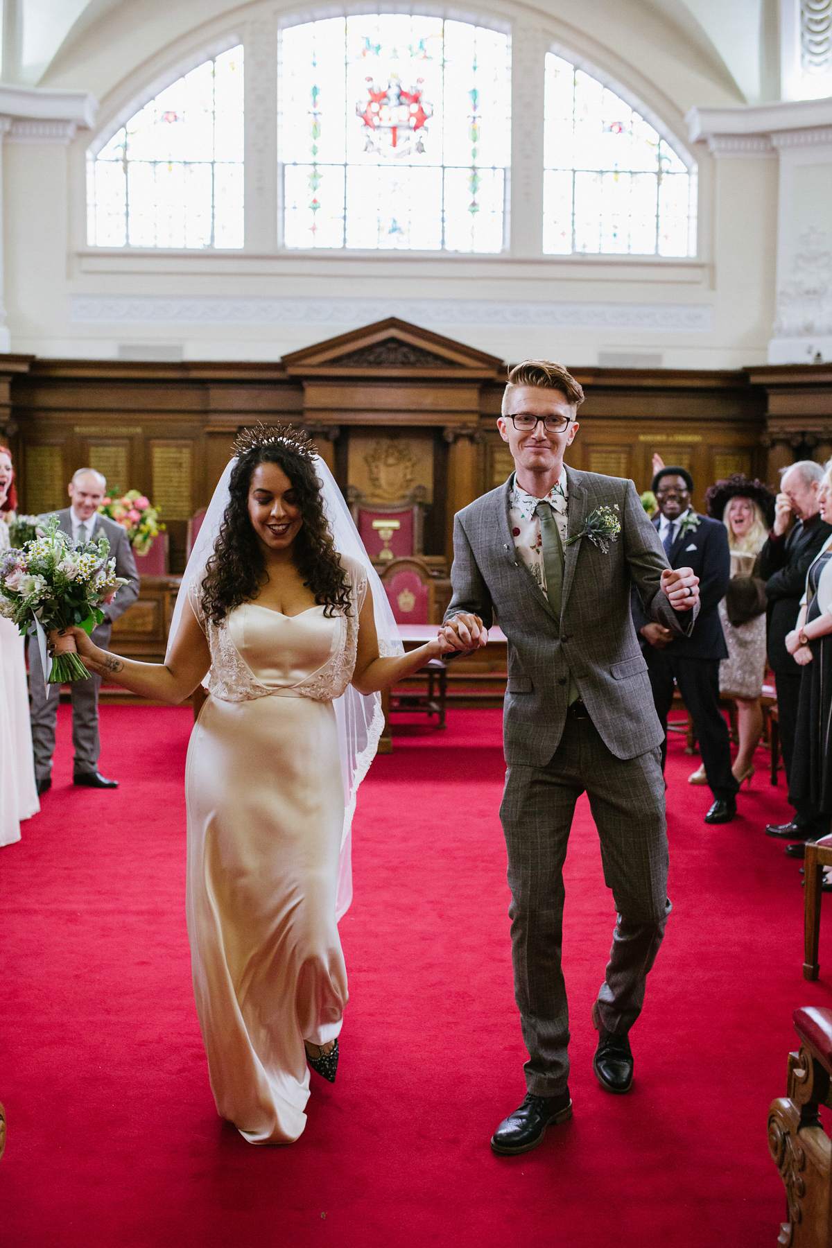 Bianca wore a Catherine Deane gown for her kitsch, cool and disco inspired London wedding. Photography by Emma Case.