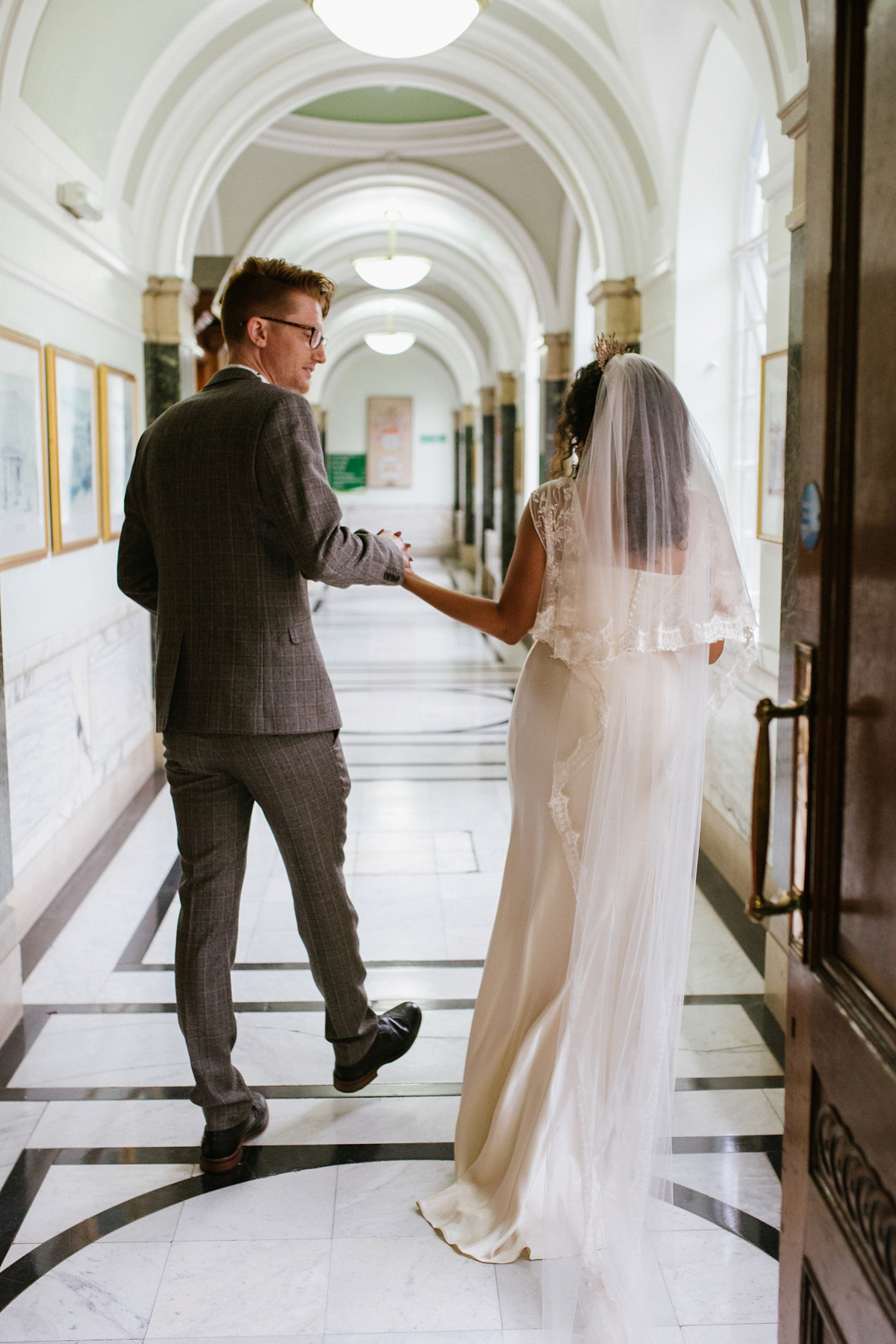 Bianca wore a Catherine Deane gown for her kitsch, cool and disco inspired London wedding. Photography by Emma Case.