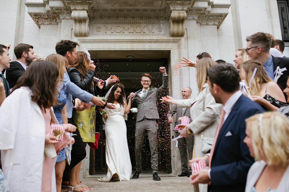 Bianca wore a Catherine Deane gown for her kitsch, cool and disco inspired London wedding. Photography by Emma Case.