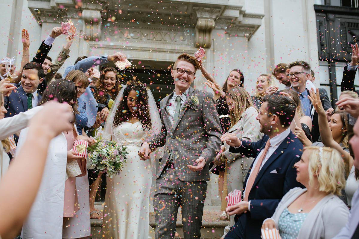 Bianca wore a Catherine Deane gown for her kitsch, cool and disco inspired London wedding. Photography by Emma Case.