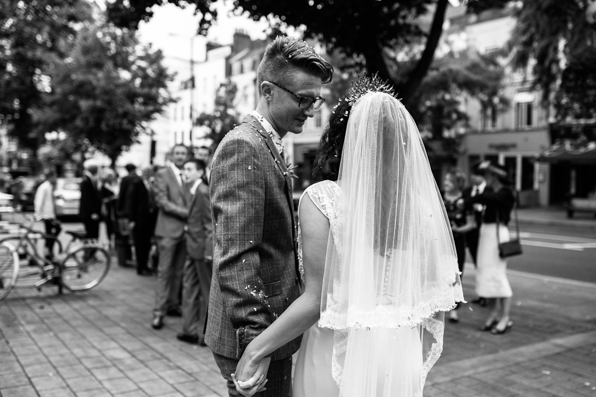 Bianca wore a Catherine Deane gown for her kitsch, cool and disco inspired London wedding. Photography by Emma Case.