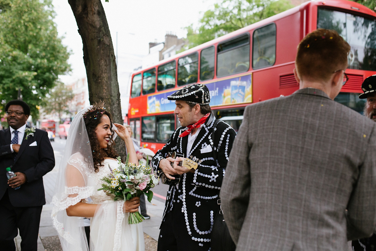 Bianca wore a Catherine Deane gown for her kitsch, cool and disco inspired London wedding. Photography by Emma Case.