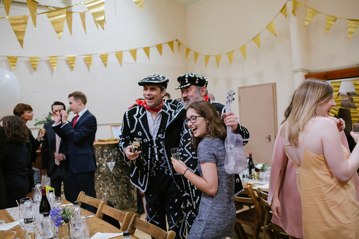 Bianca wore a Catherine Deane gown for her kitsch, cool and disco inspired London wedding. Photography by Emma Case.