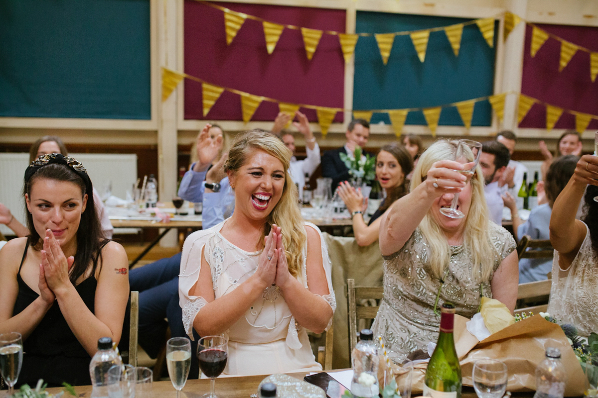 Bianca wore a Catherine Deane gown for her kitsch, cool and disco inspired London wedding. Photography by Emma Case.