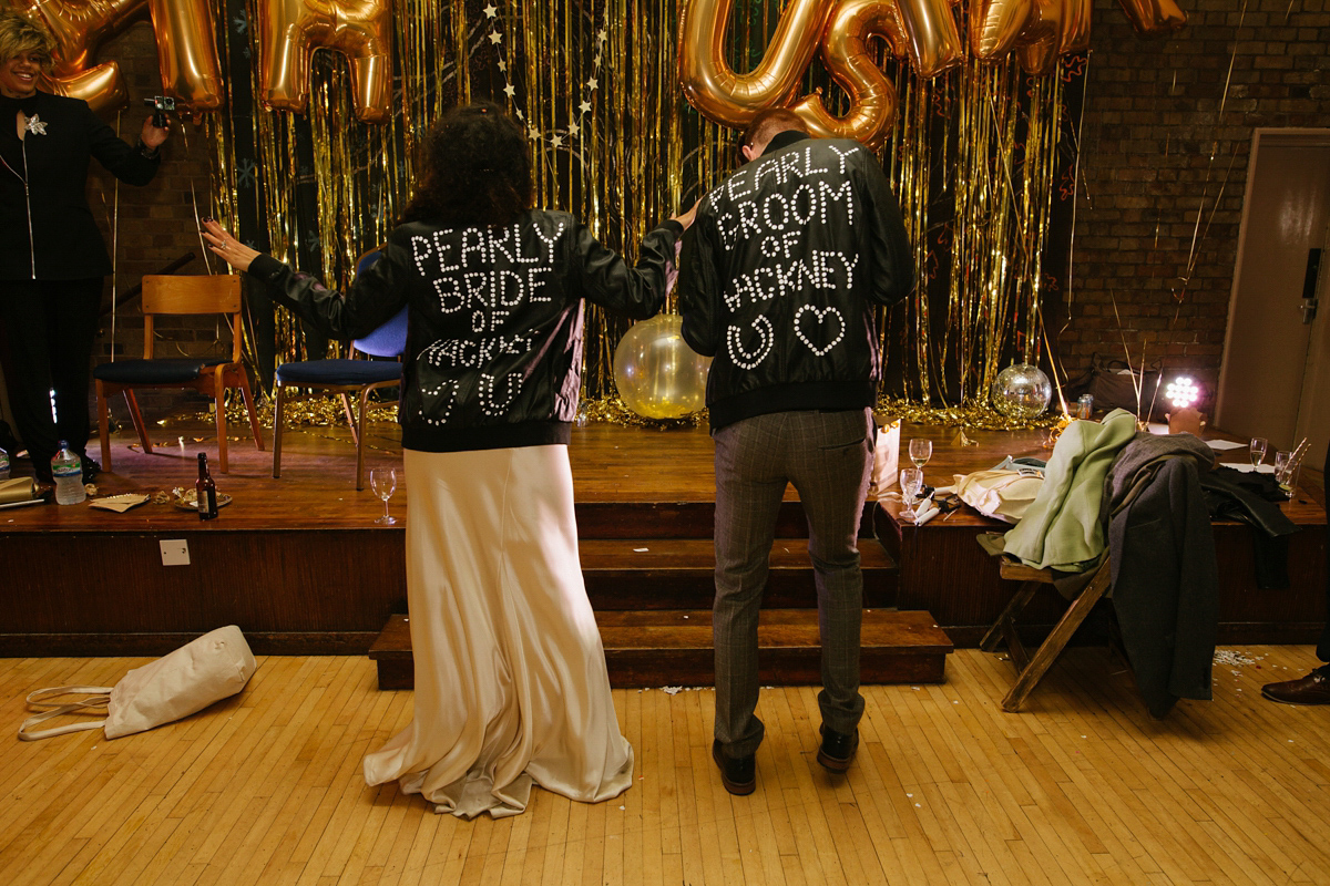 Bianca wore a Catherine Deane gown for her kitsch, cool and disco inspired London wedding. Photography by Emma Case.
