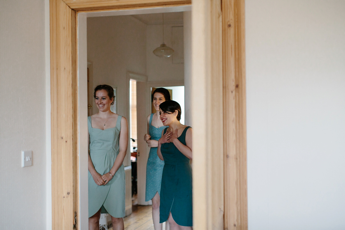 Rosa wore a boho dress by eco-bridal fashion label Minna for her vegetarian feast, secret herb garden wedding. Photography by Caro Weiss.