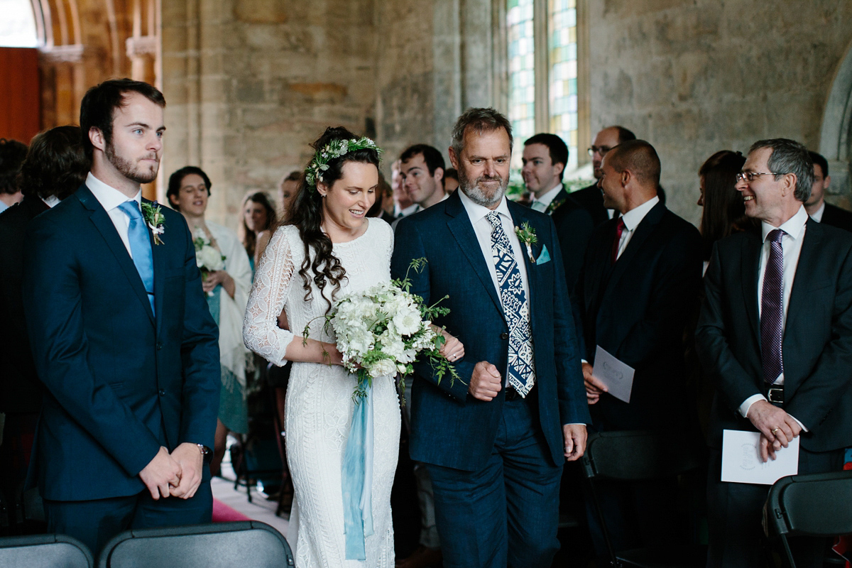 Rosa wore a boho dress by eco-bridal fashion label Minna for her vegetarian feast, secret herb garden wedding. Photography by Caro Weiss.