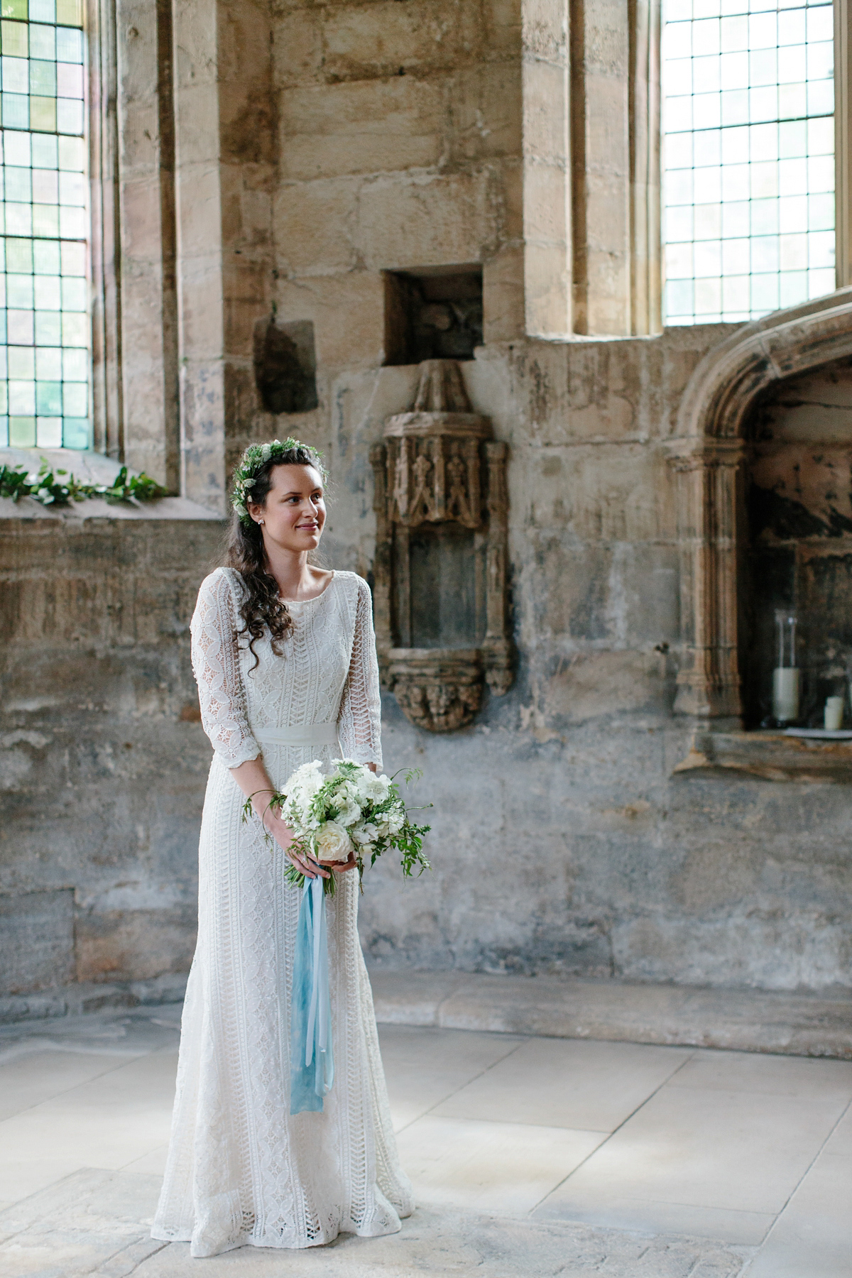 Rosa wore a boho dress by eco-bridal fashion label Minna for her vegetarian feast, secret herb garden wedding. Photography by Caro Weiss.