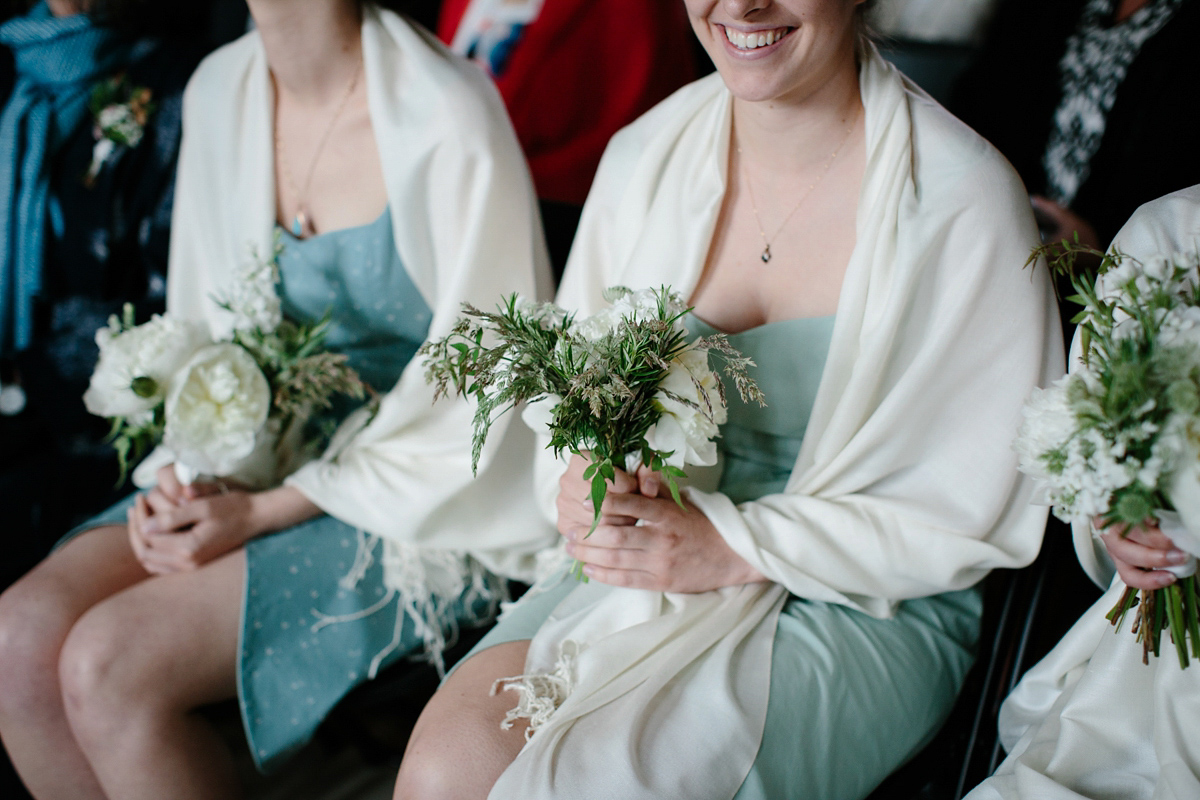 Rosa wore a boho dress by eco-bridal fashion label Minna for her vegetarian feast, secret herb garden wedding. Photography by Caro Weiss.