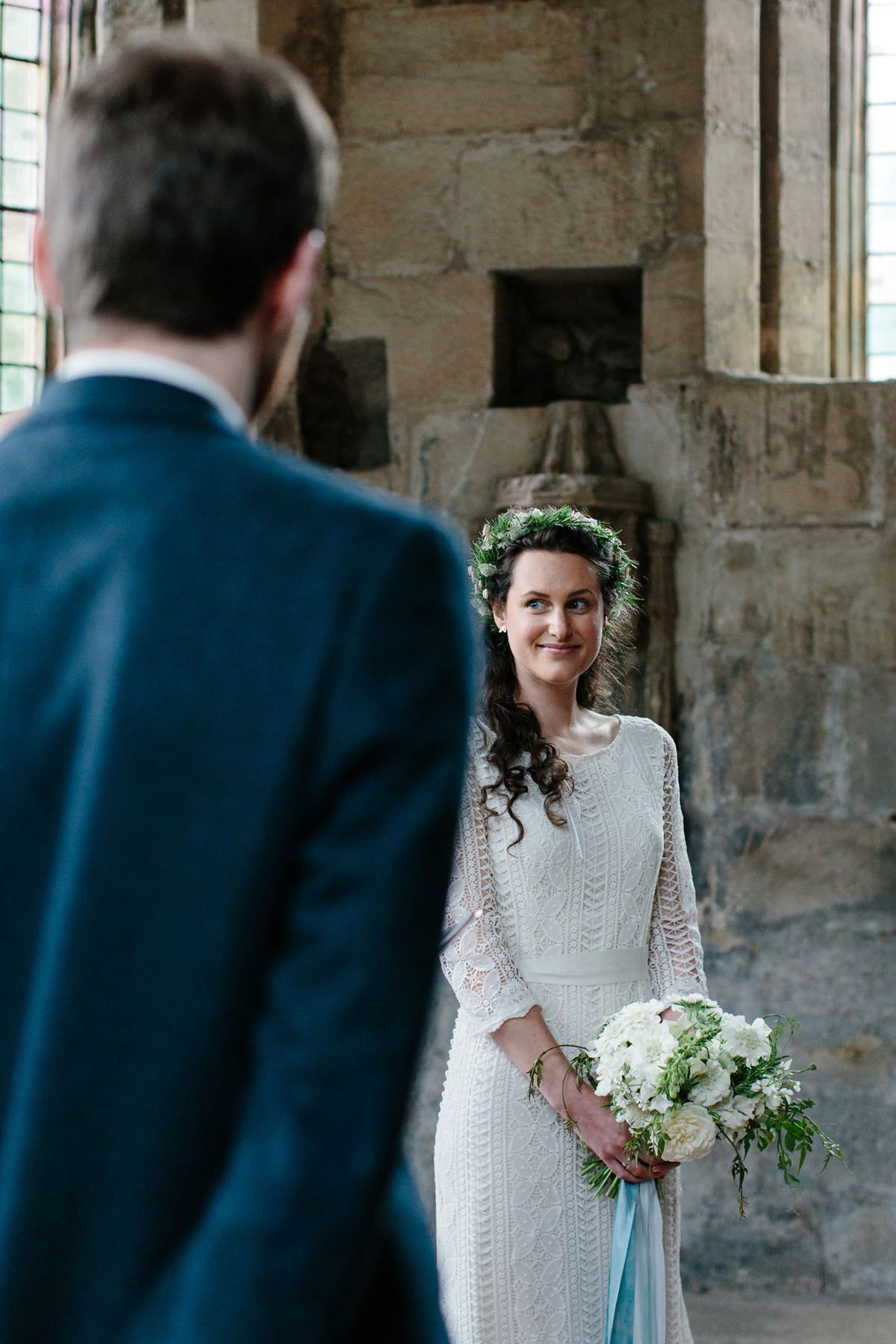 Rosa wore a boho dress by eco-bridal fashion label Minna for her vegetarian feast, secret herb garden wedding. Photography by Caro Weiss.