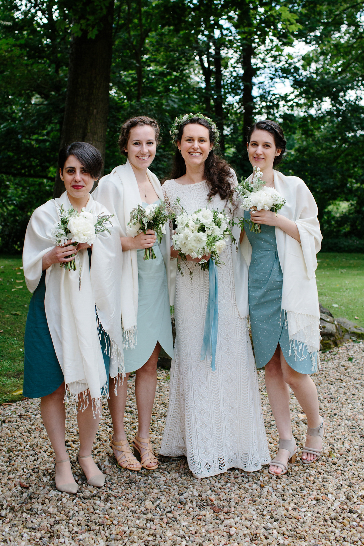 Rosa wore a boho dress by eco-bridal fashion label Minna for her vegetarian feast, secret herb garden wedding. Photography by Caro Weiss.