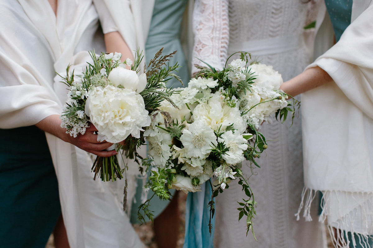 Rosa wore a boho dress by eco-bridal fashion label Minna for her vegetarian feast, secret herb garden wedding. Photography by Caro Weiss.