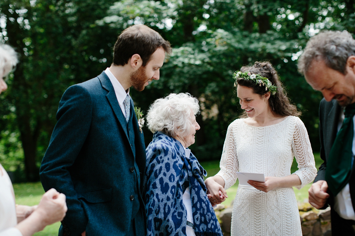 Rosa wore a boho dress by eco-bridal fashion label Minna for her vegetarian feast, secret herb garden wedding. Photography by Caro Weiss.