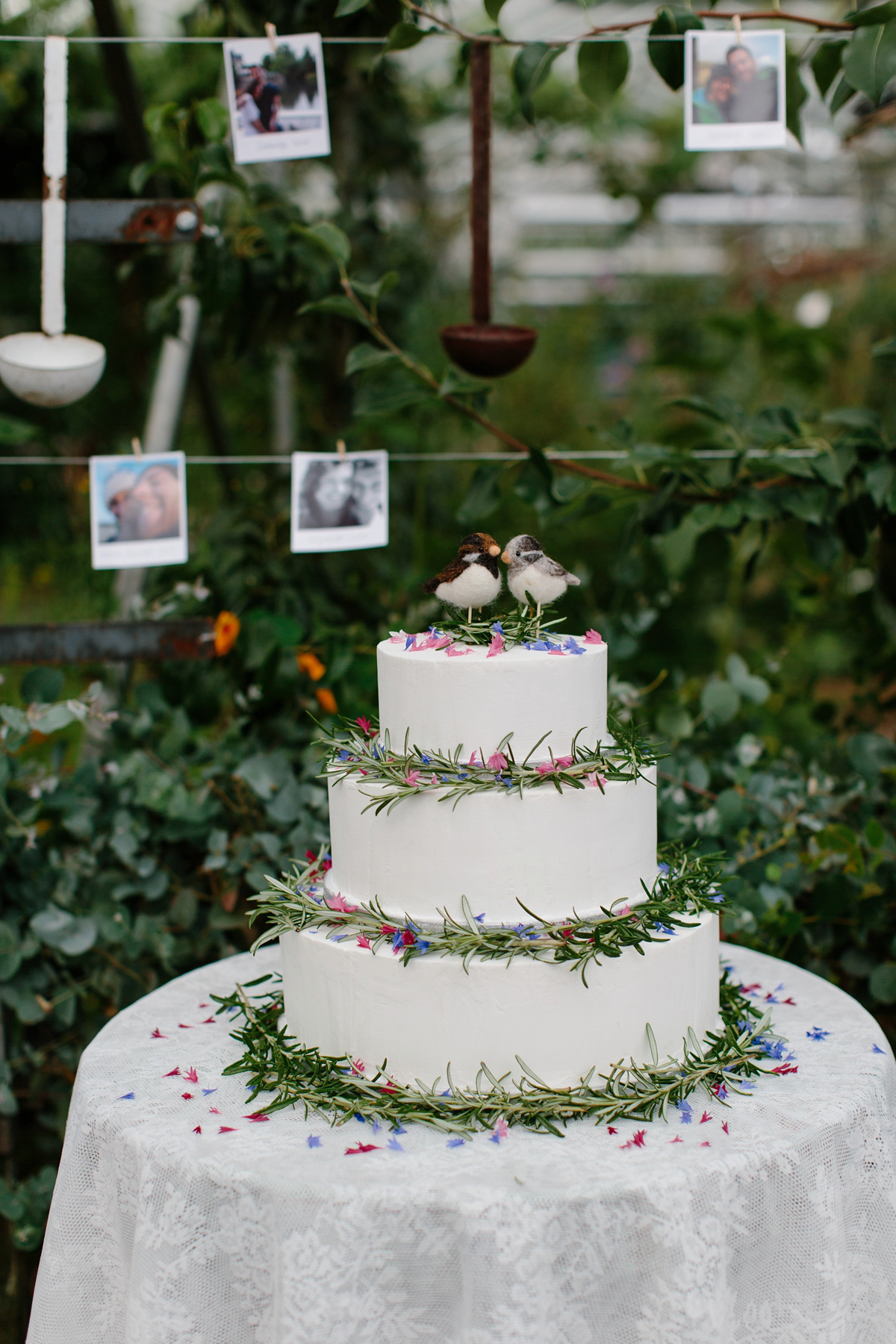 Rosa wore a boho dress by eco-bridal fashion label Minna for her vegetarian feast, secret herb garden wedding. Photography by Caro Weiss.