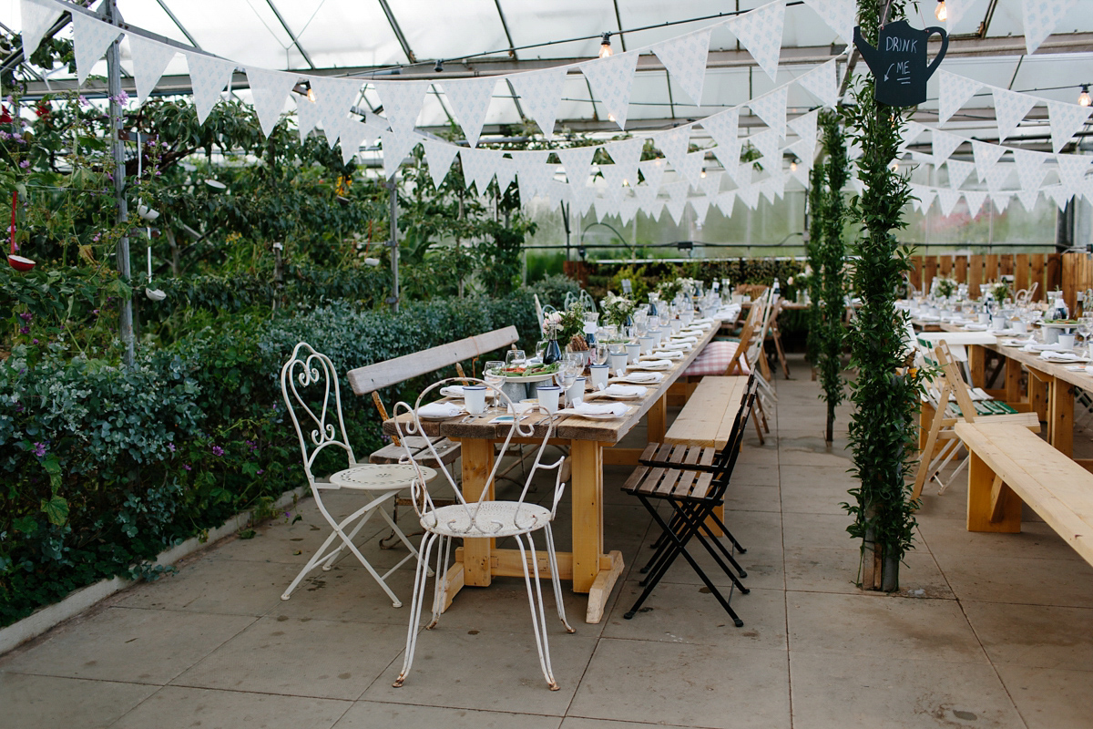 Rosa wore a boho dress by eco-bridal fashion label Minna for her vegetarian feast, secret herb garden wedding. Photography by Caro Weiss.