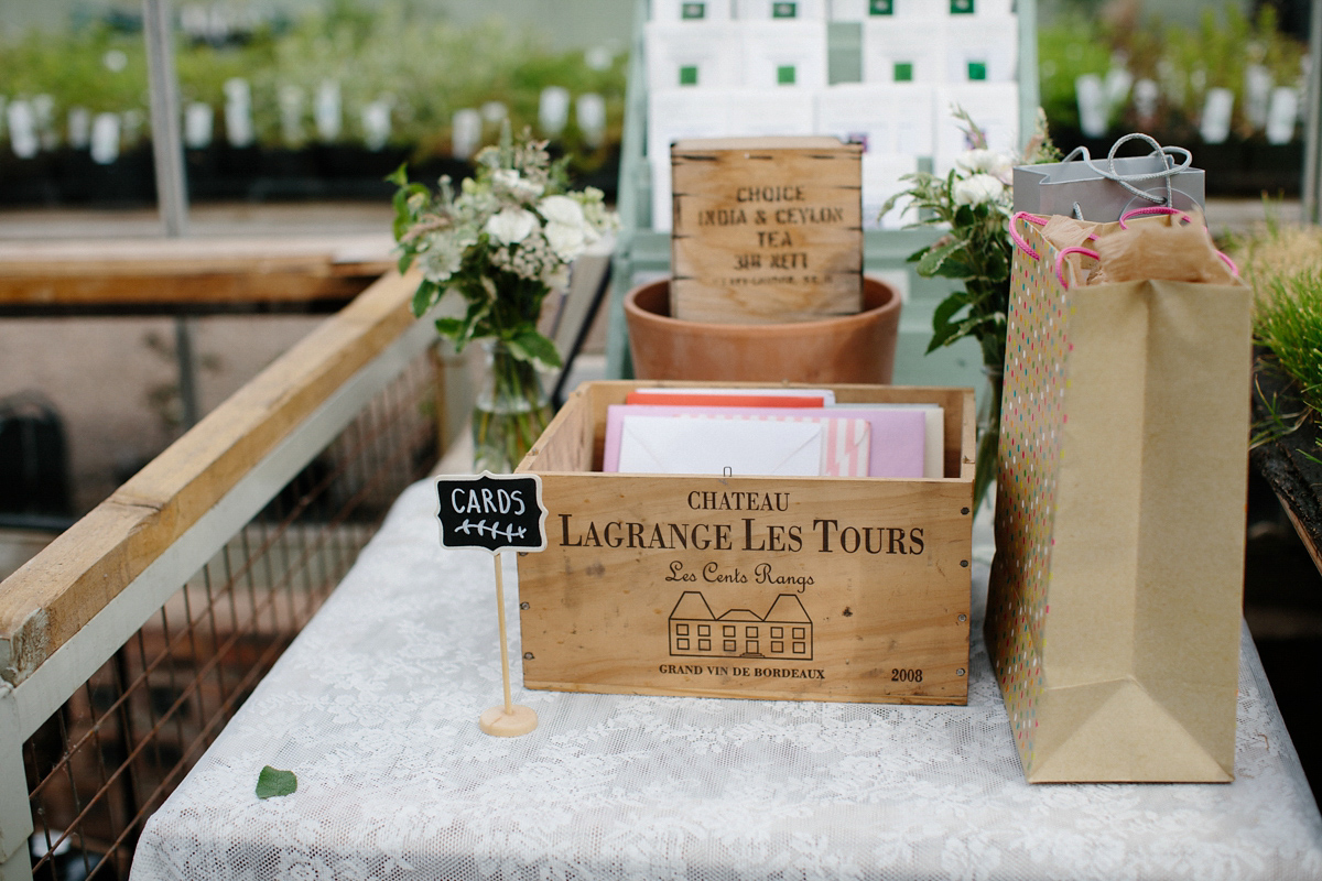 Rosa wore a boho dress by eco-bridal fashion label Minna for her vegetarian feast, secret herb garden wedding. Photography by Caro Weiss.