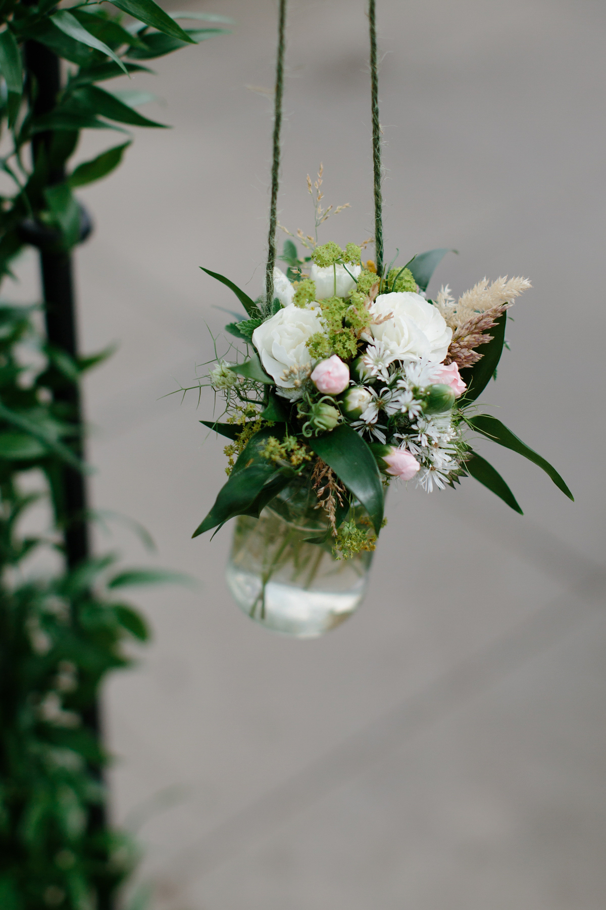 Rosa wore a boho dress by eco-bridal fashion label Minna for her vegetarian feast, secret herb garden wedding. Photography by Caro Weiss.