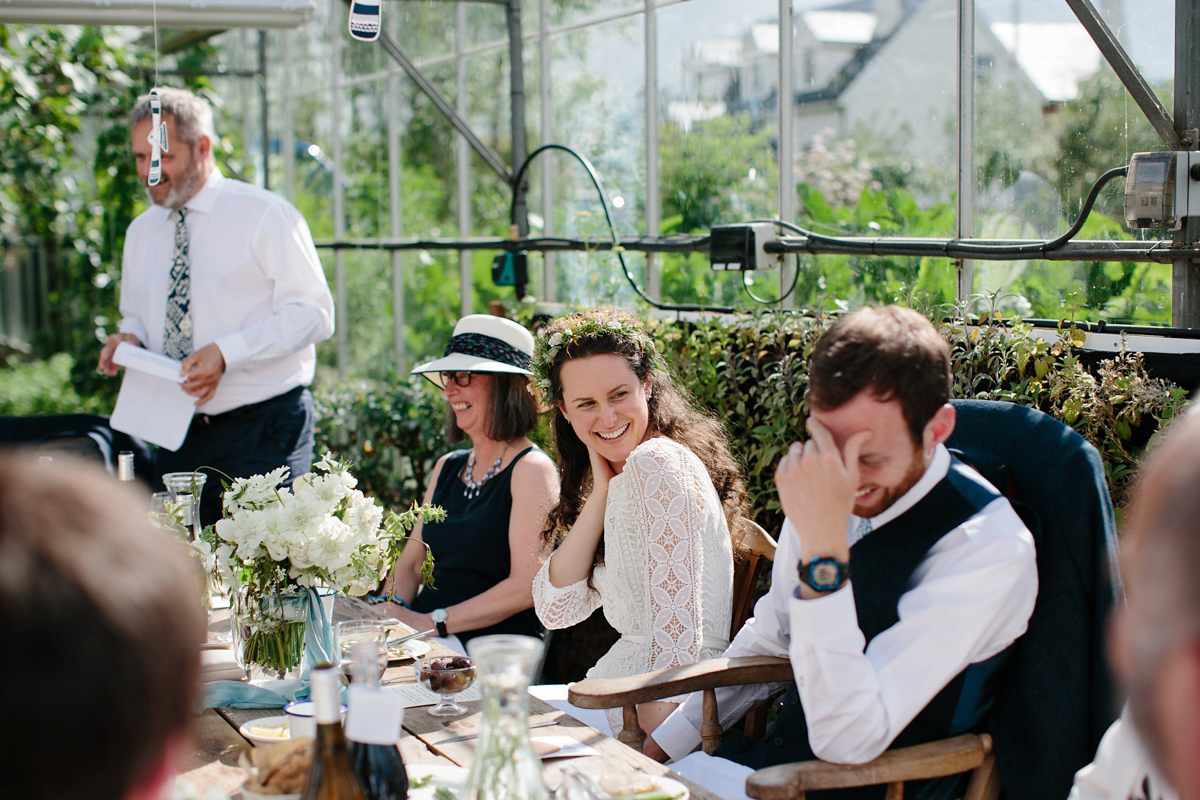 Rosa wore a boho dress by eco-bridal fashion label Minna for her vegetarian feast, secret herb garden wedding. Photography by Caro Weiss.