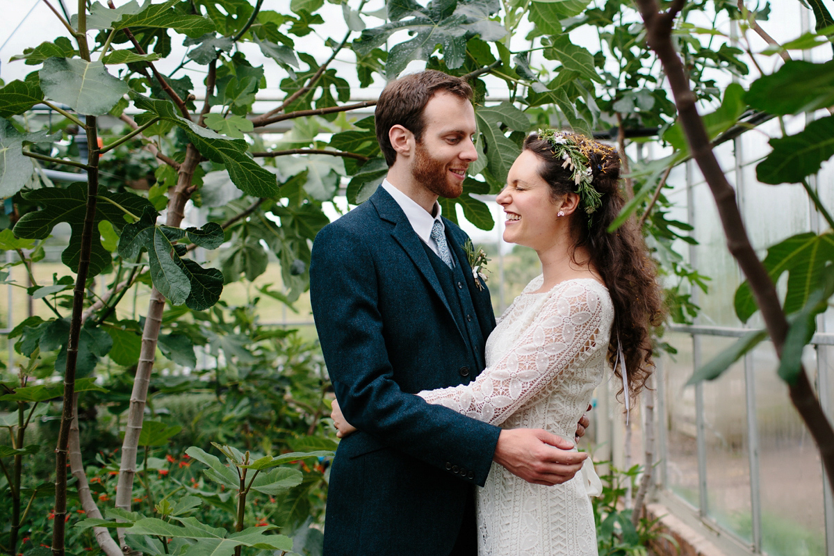 Rosa wore a boho dress by eco-bridal fashion label Minna for her vegetarian feast, secret herb garden wedding. Photography by Caro Weiss.
