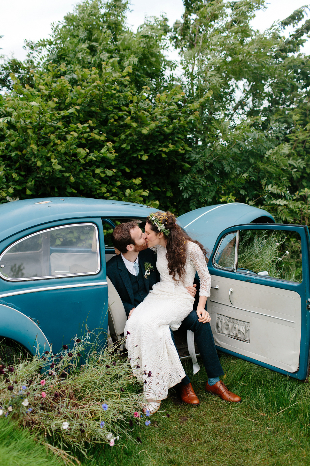 Rosa wore a boho dress by eco-bridal fashion label Minna for her vegetarian feast, secret herb garden wedding. Photography by Caro Weiss.