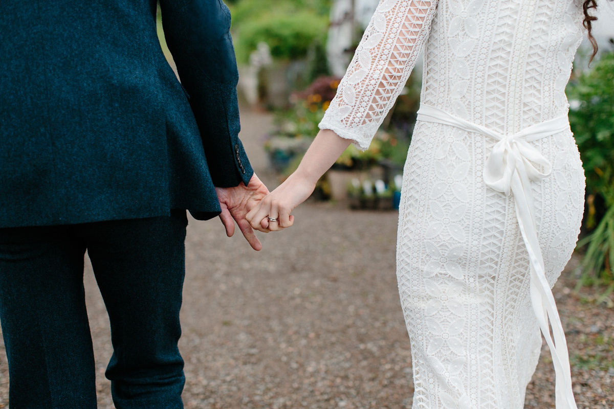 Rosa wore a boho dress by eco-bridal fashion label Minna for her vegetarian feast, secret herb garden wedding. Photography by Caro Weiss.