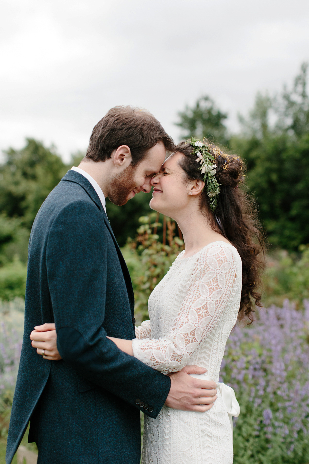 Rosa wore a boho dress by eco-bridal fashion label Minna for her vegetarian feast, secret herb garden wedding. Photography by Caro Weiss.