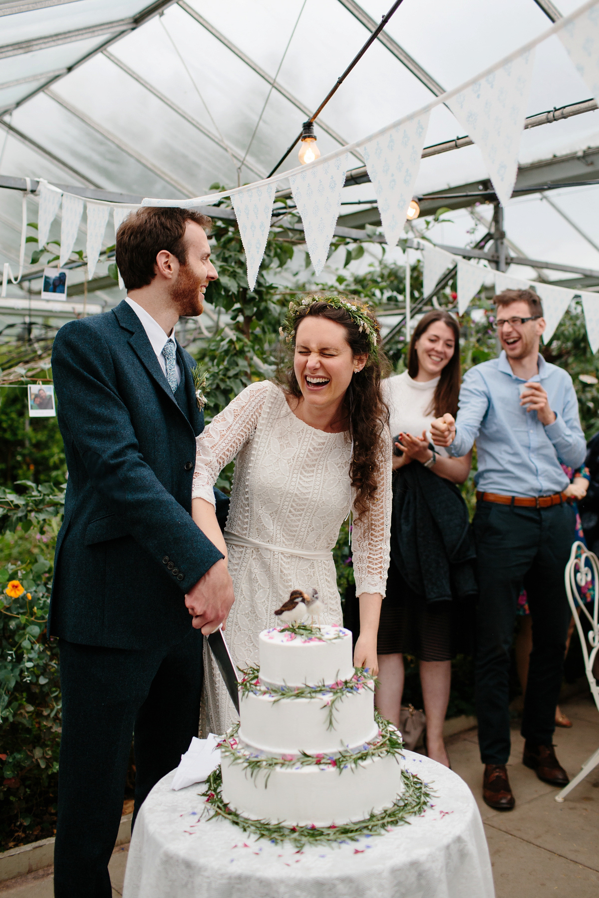 Rosa wore a boho dress by eco-bridal fashion label Minna for her vegetarian feast, secret herb garden wedding. Photography by Caro Weiss.