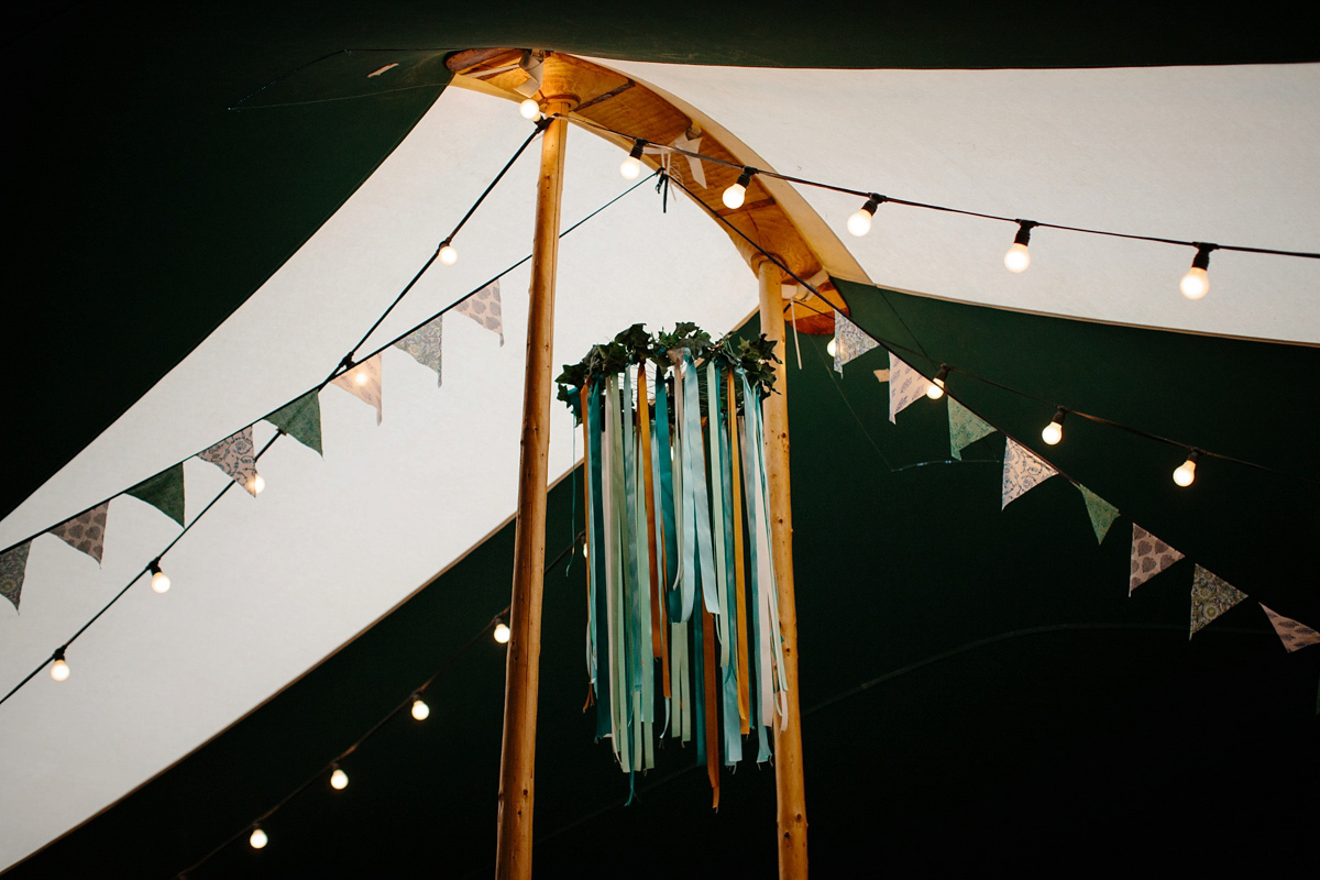 Rosa wore a boho dress by eco-bridal fashion label Minna for her vegetarian feast, secret herb garden wedding. Photography by Caro Weiss.