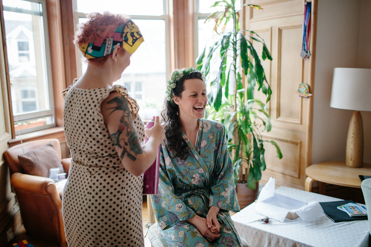 Rosa wore a boho dress by eco-bridal fashion label Minna for her vegetarian feast, secret herb garden wedding. Photography by Caro Weiss.