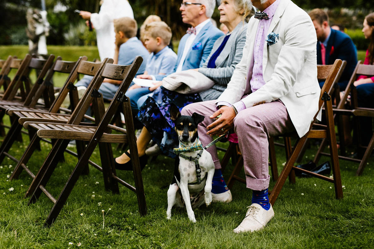 Kirsty wore a Rue de Seine gown from Leonie C. Bridal boutique in Brighton. Her handmade, Summer wedding took place in a Game of Thrones venue in Downpatrick. It was filled with floral chandeliers. Photography by Honey and the Moon.